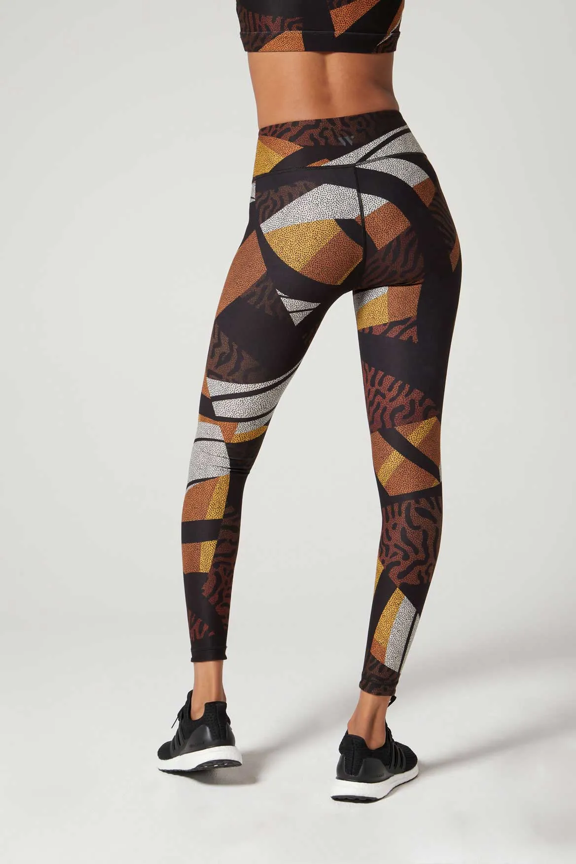 Sure! Heres an optimized title for the product with additional descriptive modifiers:

Aria High-Waisted Back Pocket Leggings - Totem Pattern, Moisture-Wicking, and Four-Way Stretch Fabric
