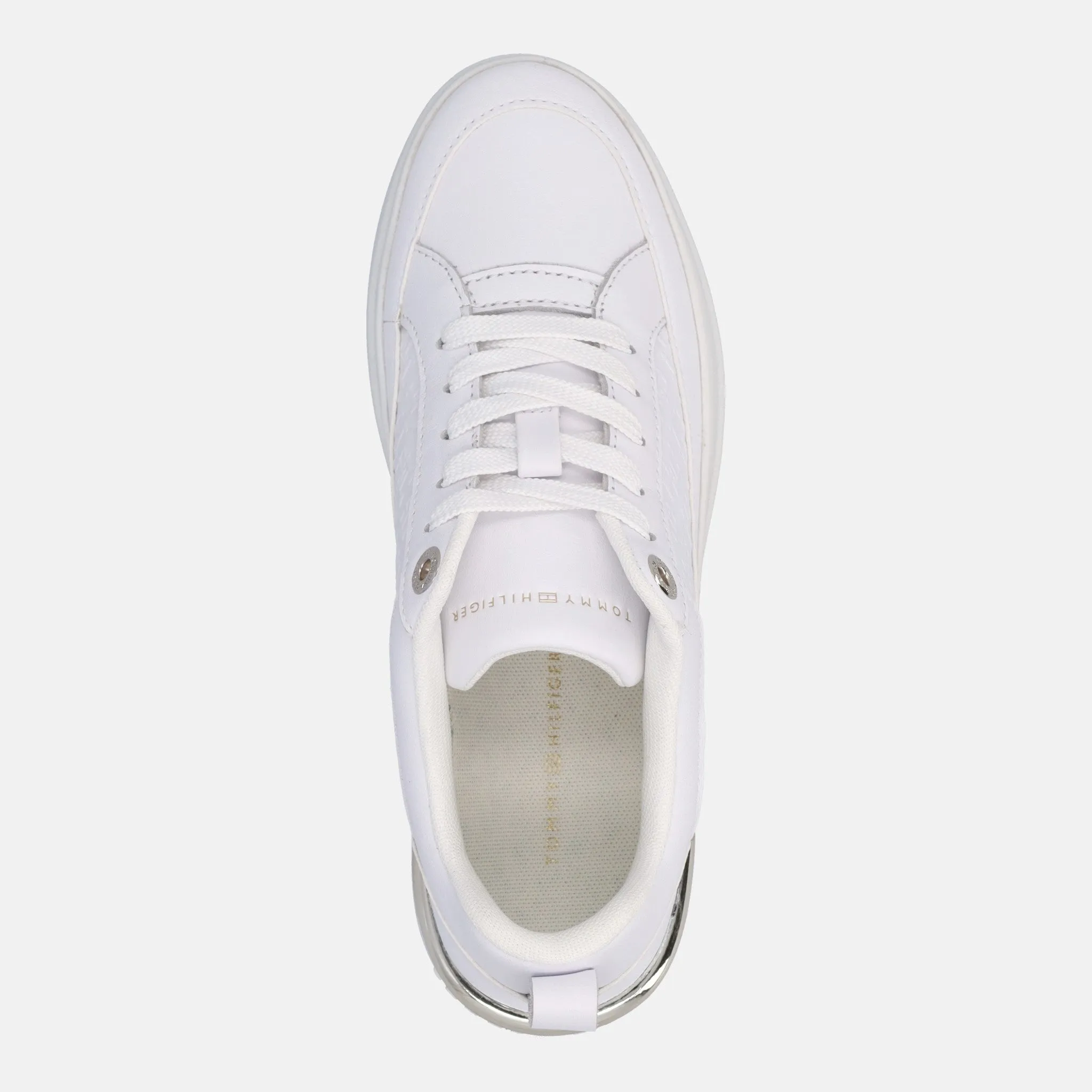 Certainly! Heres an optimized title for your e-commerce product:

Tommy Hilfiger Lux Court Monogram Sneakers – Stylish Designer Casual Shoes