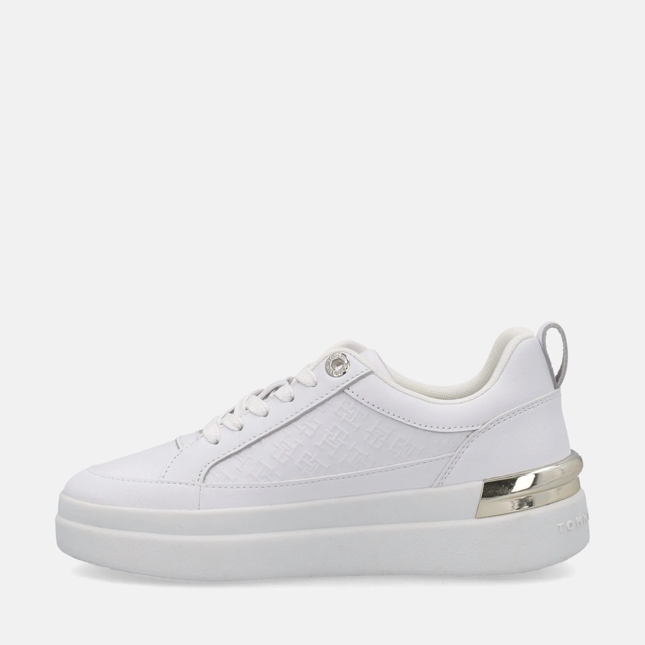 Certainly! Heres an optimized title for your e-commerce product:

Tommy Hilfiger Lux Court Monogram Sneakers – Stylish Designer Casual Shoes